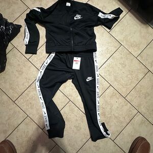 Nike Black Jacket with White Tag